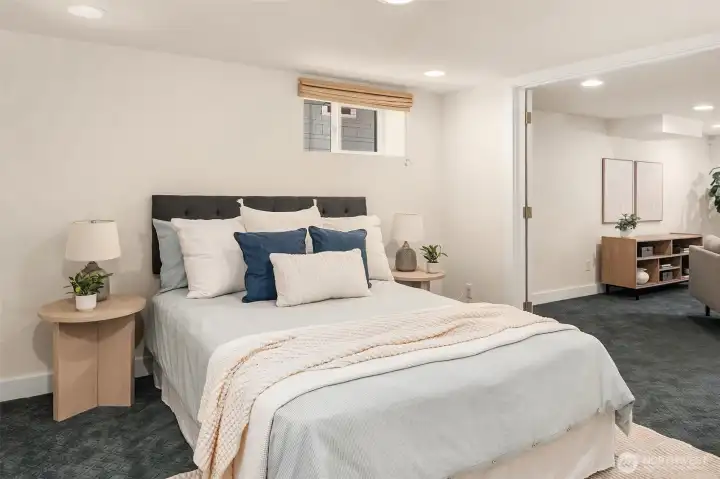 Lower level bedroom with French doors to open up the space and connect to the 2nd living room. Lower level bedroom with French doors to open up the space and connect to the 2nd living room.