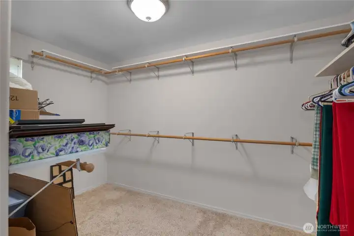 PBR closet - Oversized walk-in closet with extensive hanging space and shelving keeps everything organized. PBR closet - Oversized walk-in closet with extensive hanging space and shelving keeps everything organized.