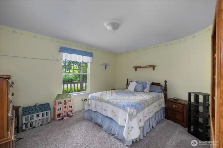 BR 2 - Generously sized bedroom with large window, plush carpet, and ample space for furniture. BR 2 - Generously sized bedroom with large window, plush carpet, and ample space for furniture.