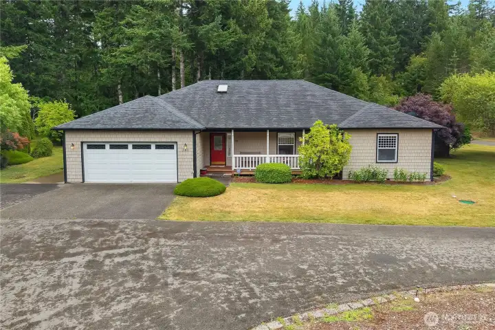 Enjoy morning coffee on the covered front porch while taking in the quiet surroundings. Enjoy morning coffee on the covered front porch while taking in the quiet surroundings.