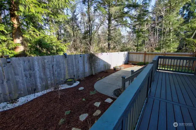 Yard is thoughtfully landscaped.  There are many more plants that will come up in the spring, so it will be a lovely surprise to see it in its full glory!