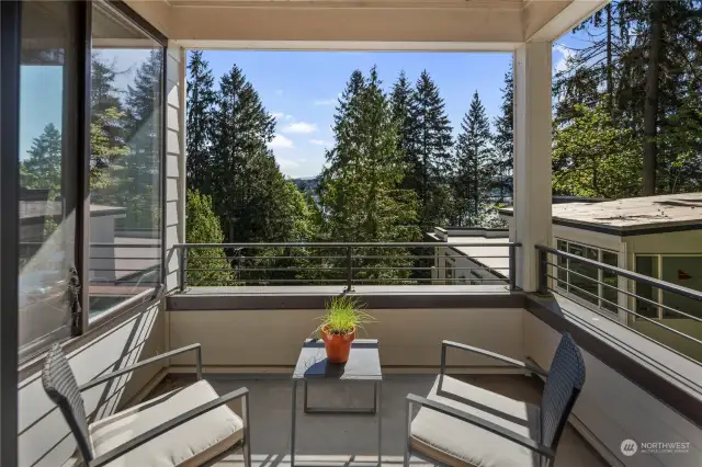 Enjoy morning coffee on your second floor deck overlooking the lake and mountains