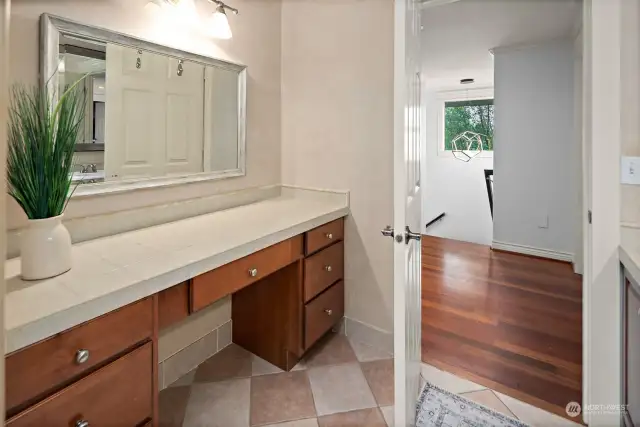 Main bath upper level with ample counter space & storage.