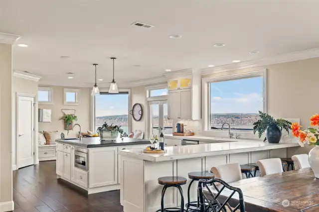 Updated kitchen with center island, quartz counters, stainless appliances.