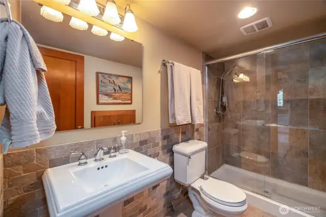 Main floor full bathroom with beautiful slate tile