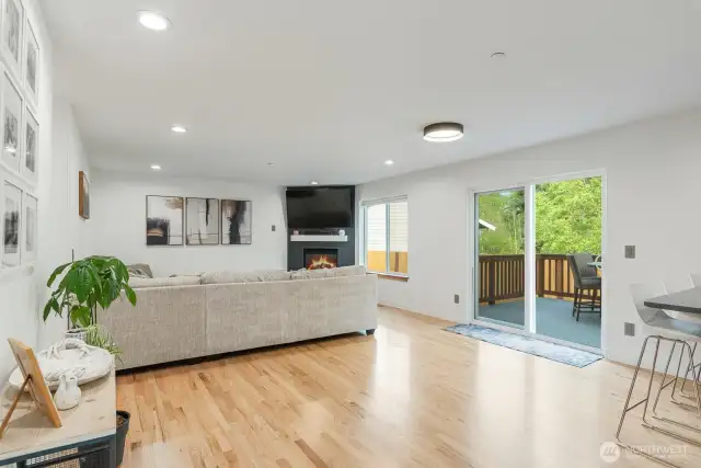 Large family room with gas fireplace.