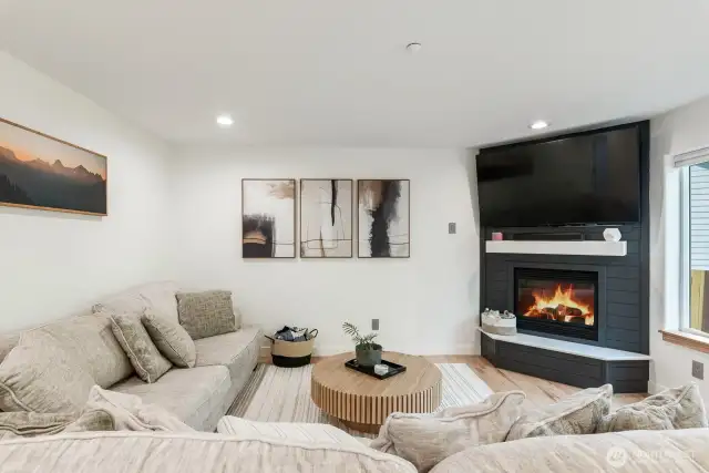Gas fireplace with new facade & TV.