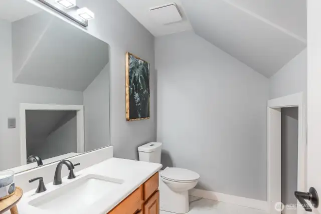 Downstairs bathroom with lots of storage space.