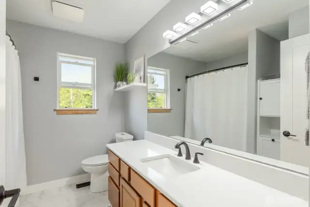 Full bathroom upstairs, all new quartz countertop.