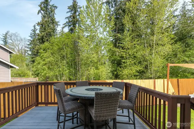 Deck off kitchen and family room, view of trees in the greenbelt.