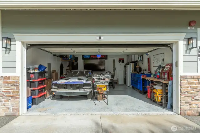 Two car garage with epoxy floor finish.