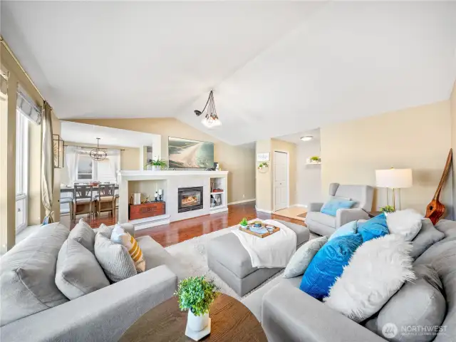 Large living area with vaulted ceilings & wonderful natural light!