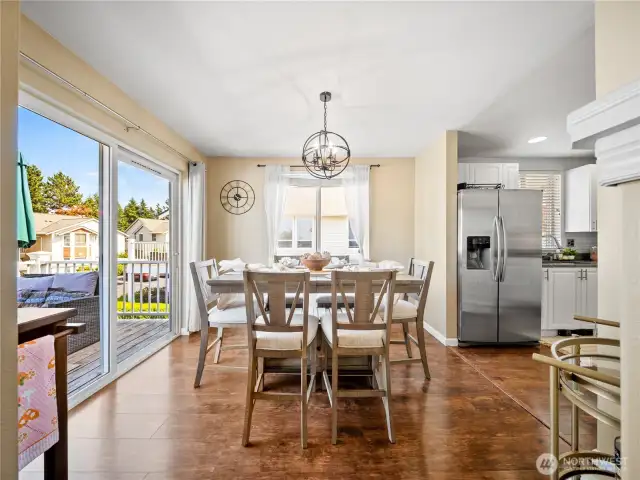 Dining room with slider access to the deck & kitchen to the right!