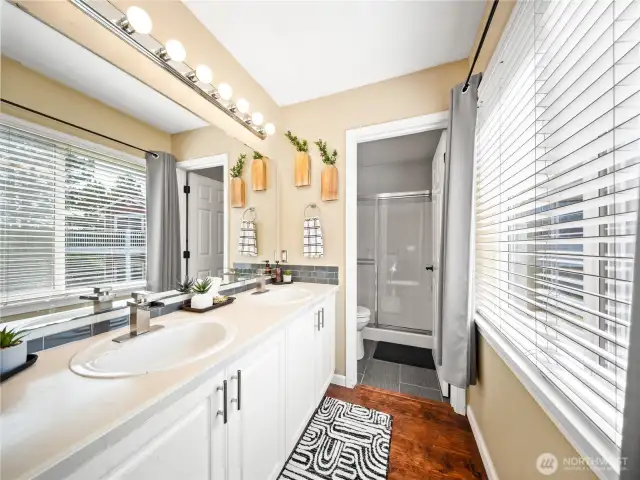 Primary ensuite  with double vanity and double shower.
