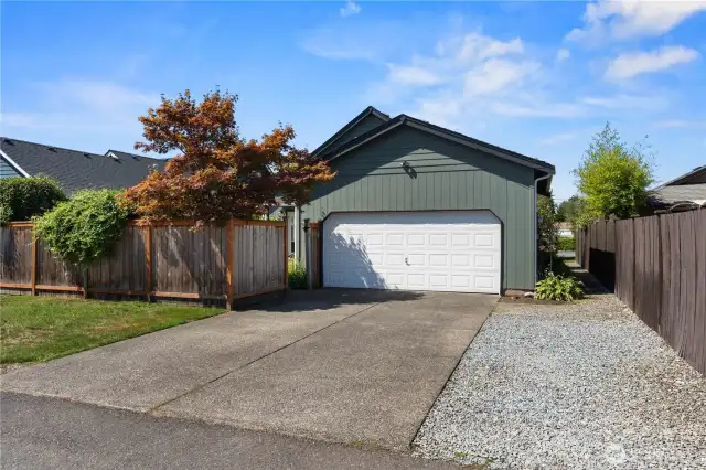 Garage and driveway are accessible from the alley