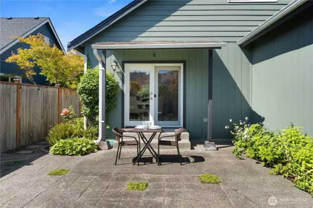 French doors lead to kitchen for easy summer living