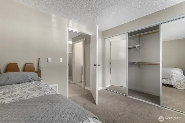 Full wall mirrored closet.