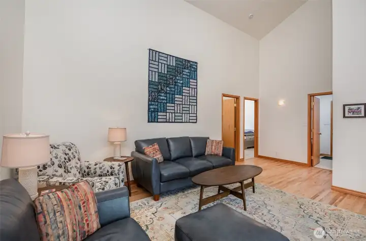 Large family room echo the expansive vaulted ceilings.