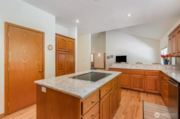 Kitchen has plenty of cabinet space along with beautiful quartz countertops.