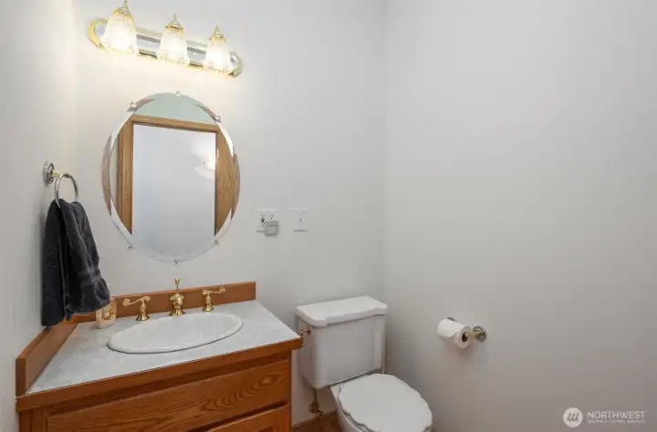 Half bathroom located at the center of the home, great for guests!
