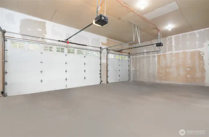 Large 3 car garage great for cars, storage, could also be a wonderful work out space.