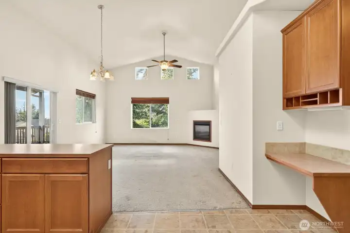 Desk space and more cabinets in kitchen area