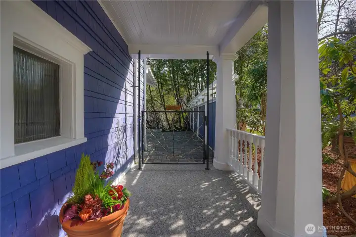 Front gate leads to paver patio & wrap around deck. Welcome to Paradeisos!