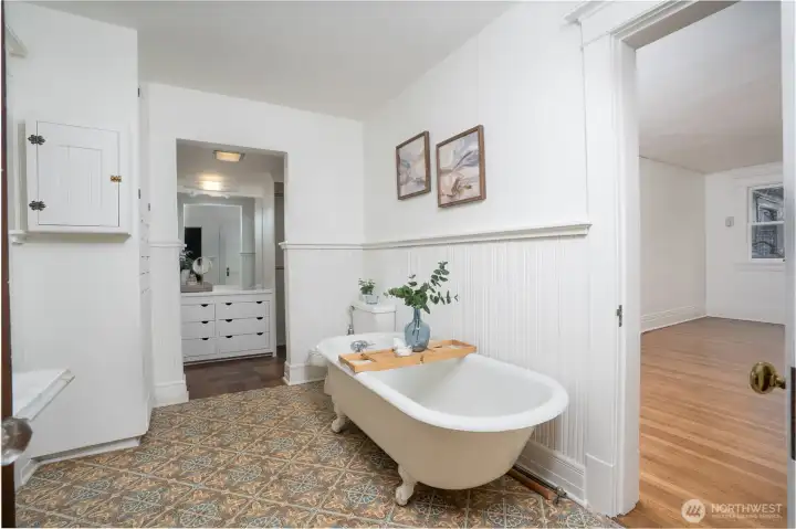 Bath shared between 2 Bedrooms. That is a 5th Bedroom through the door on the right.