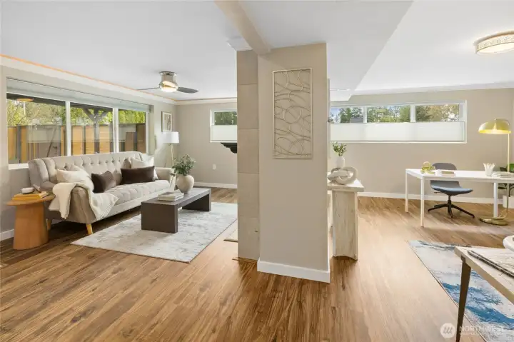 Lower level offers a central fireplace providing a warm welcome