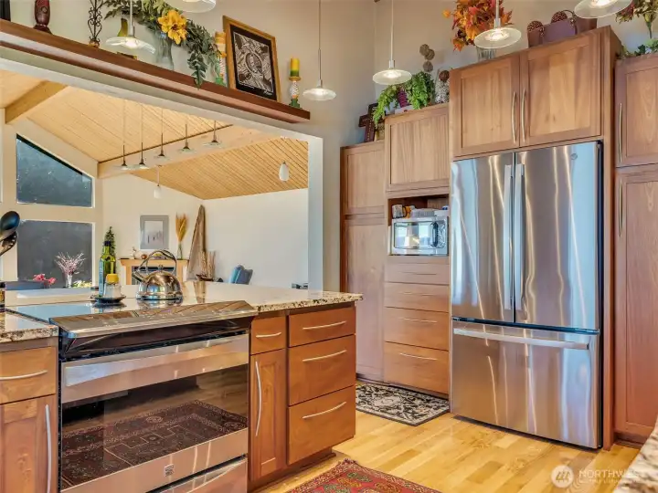 African Sapele cabinets and hardwood oak flooring.