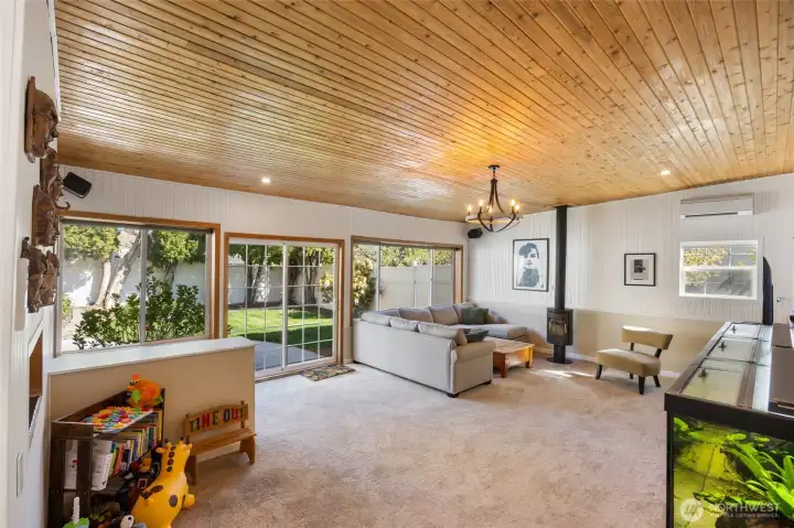 space to play, hang out, cozy up to the Danish wood stove