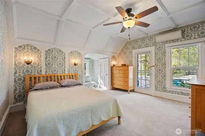 upstairs primary is spacious w/ balcony