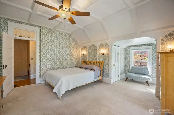 upstairs primary with amazing ceiling detail