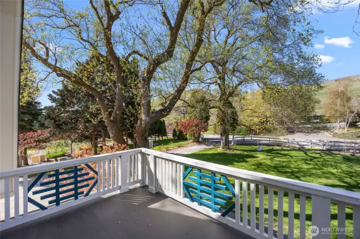 view overlooking beautiful landscaping from primary balcony