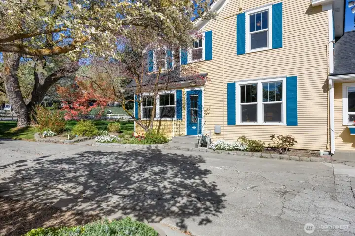 Side entrance to home, ample parking in circular drive