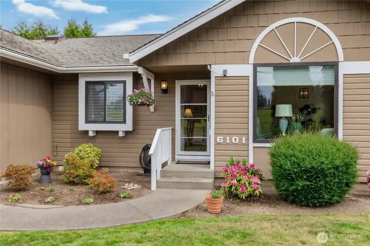 Welcoming covered front entry. This well-maintained home is completely move-in ready!