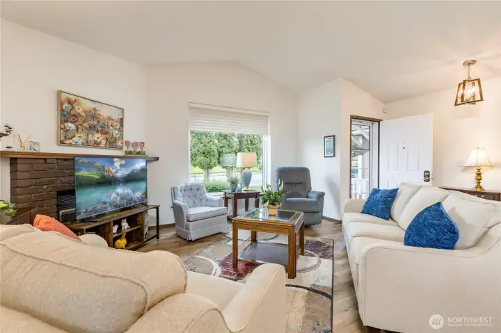 Spacious living room offers an inviting space for relaxation and entertainment
