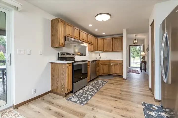 Functional kitchen design with ample storage and a flexible space for a desk or coffee bar.