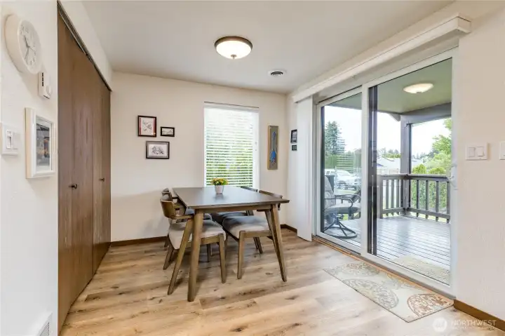 Casual dining area with direct access to the covered back deck. A dedicated laundry closet is conveniently located right where you need it!