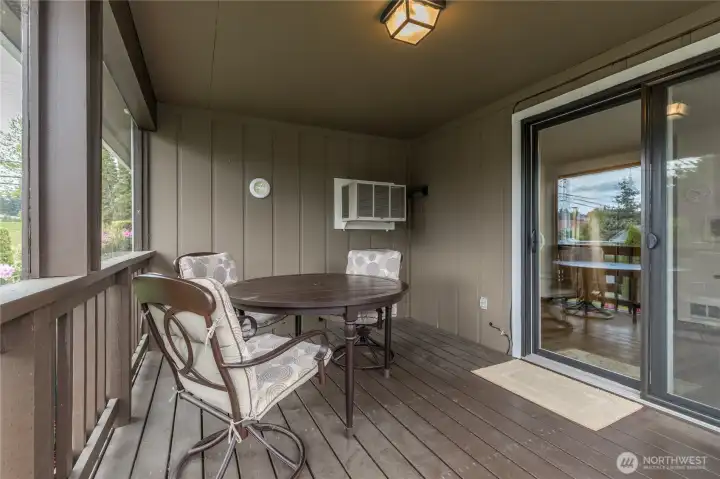 The perfect spot for your morning coffee or alfresco dining. This sheltered outdoor living space feels like an extra room!