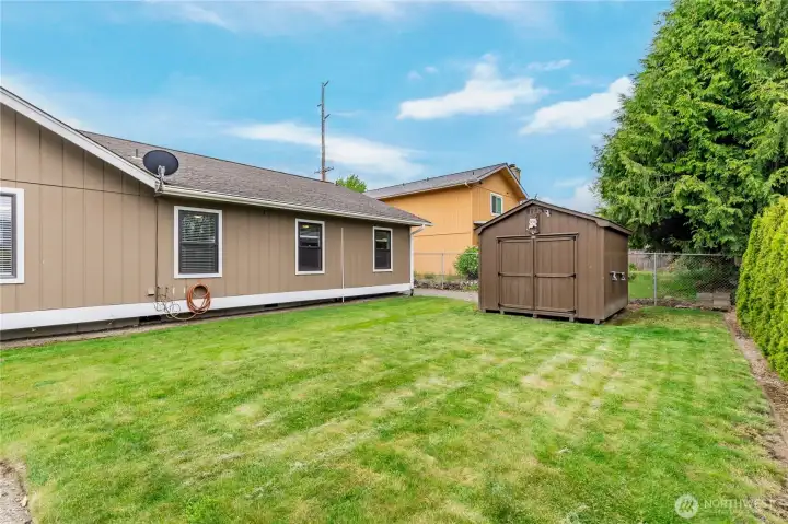 More than just a yard—plenty of space for a garden, play area, and a large shed to keep your garage clutter-free.
