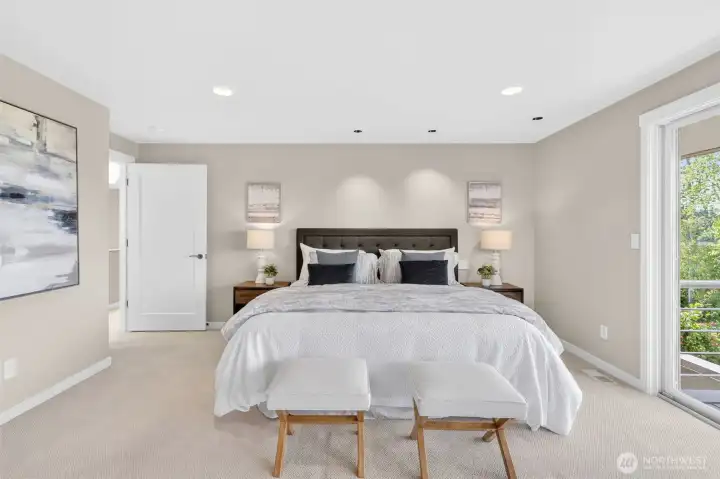 The scale of this suite speaks for itself — generous enough for a full sitting area, with direct slider access to the balcony.