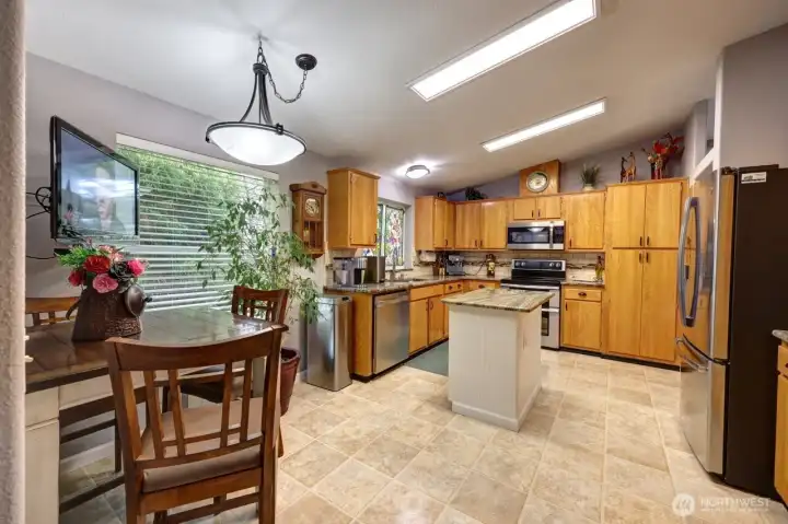 Kitchen has room for a table to keep the cook company