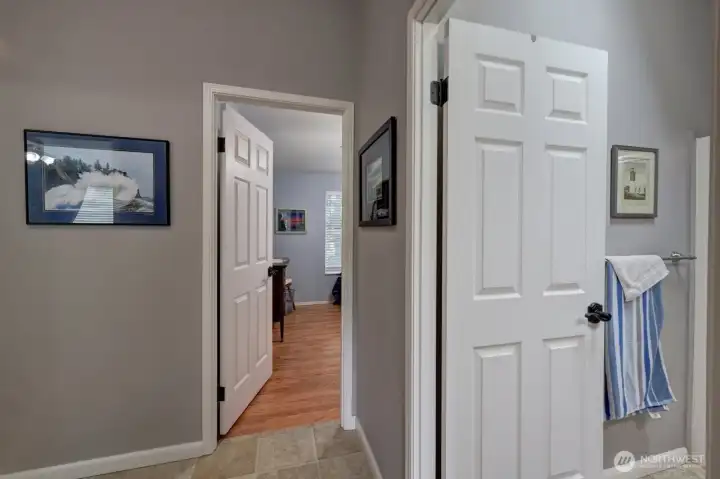 Entry to bedroom #2 and main bathroom to the right