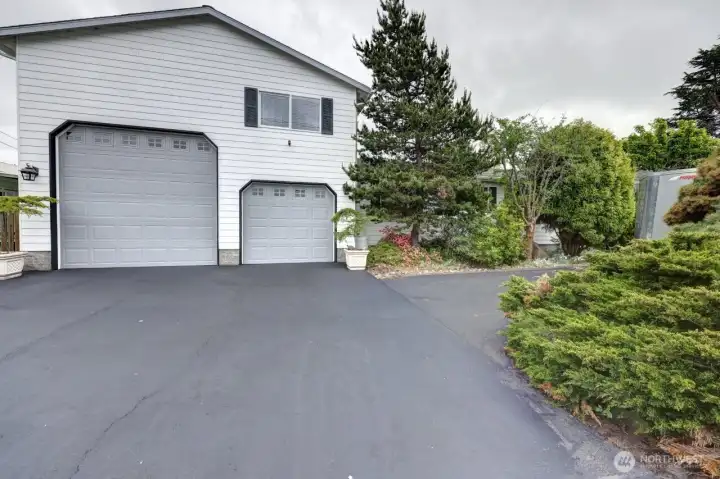 The attached garage is amazing. The 12' door provides space for many uses.
