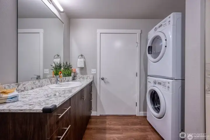 Conveniently placed bathroom and in-unit laundry by kitchen Conveniently placed bathroom and in-unit laundry by kitchen