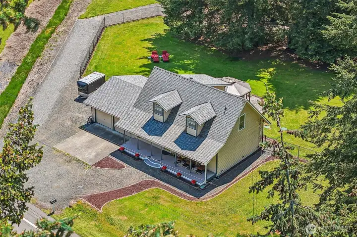 A lovely home situated on 1.3+ acres with newer 50 year Architectural Roofing