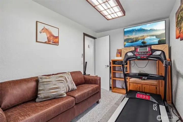 Bedroom currently utilized as a work out room