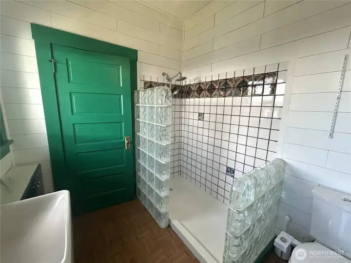 Tiled, step-in shower in great condition.