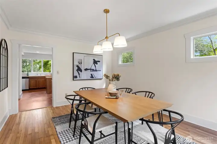 New chandelier, fresh paint and refinished floors. Sweet windows add light without giving up privacy.